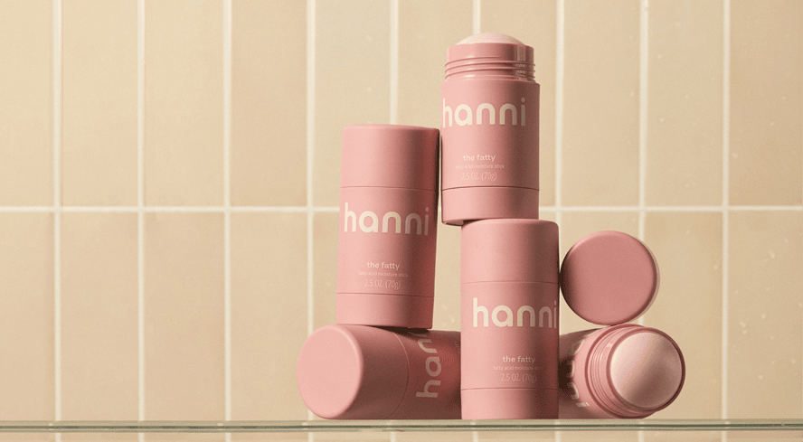 The Fatty moisturizer sticks on a bathroom shelf.